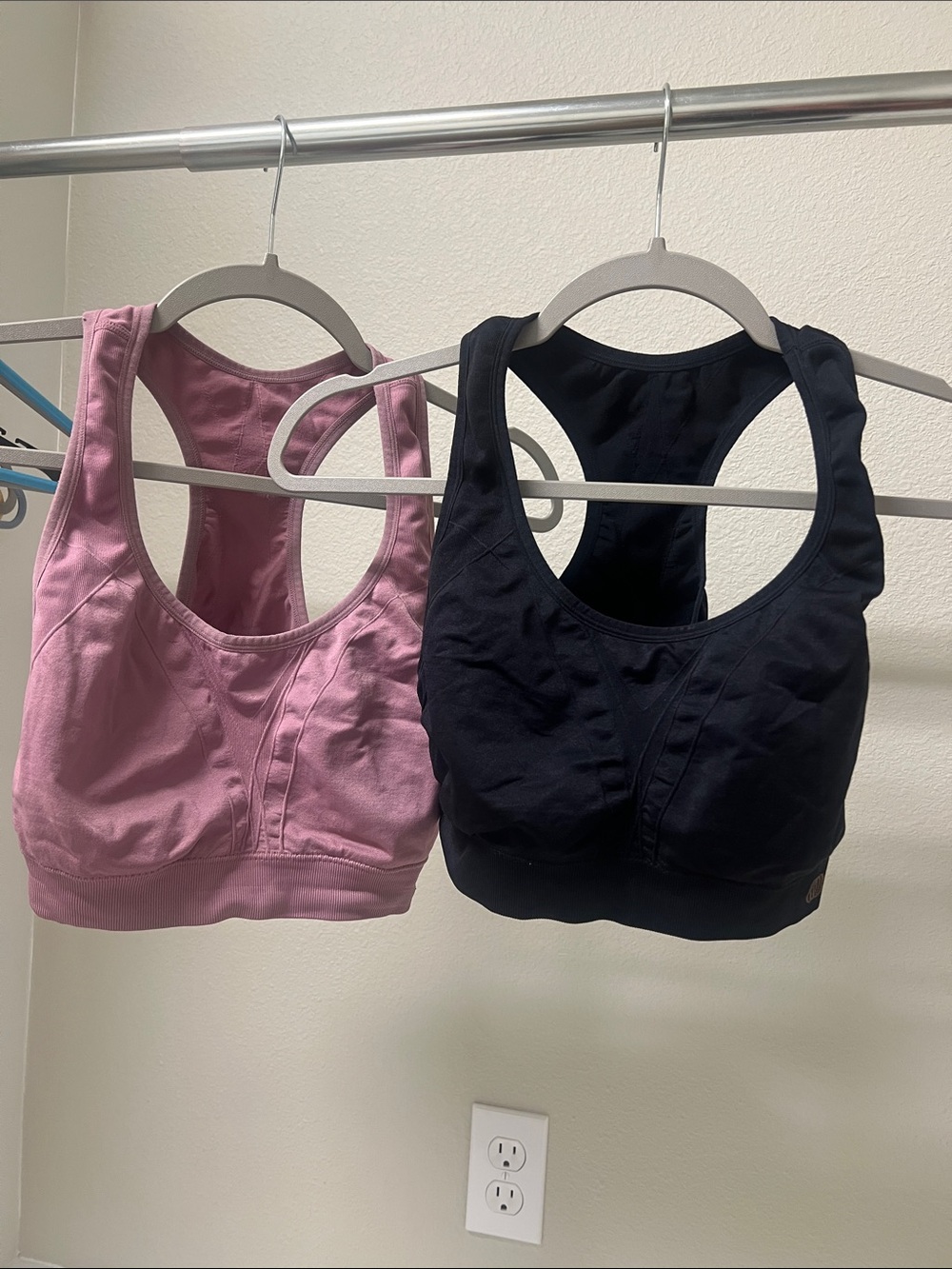 Globe Racerback Sports Bras in Pink and Black